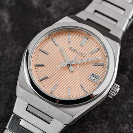 Seiko Ladies SUR577P1 Discover More Light Orange Dial Stainless Steel Strap