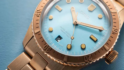 Oris Divers Sixty-Five 01-733-7771-3155-07-8-19-15 Cotton Candy Blue Dial Rose Gold St. Steel Strap