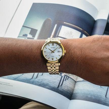 Seiko Classic SUR224P1 Neo White Dial Gold Stainless Steel Strap