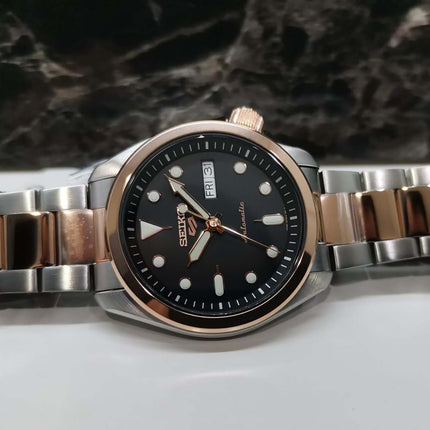 Seiko 5 Sports SRPE58K1 SKX Sports Style Black Dial Dual Tone Stainless Steel Strap